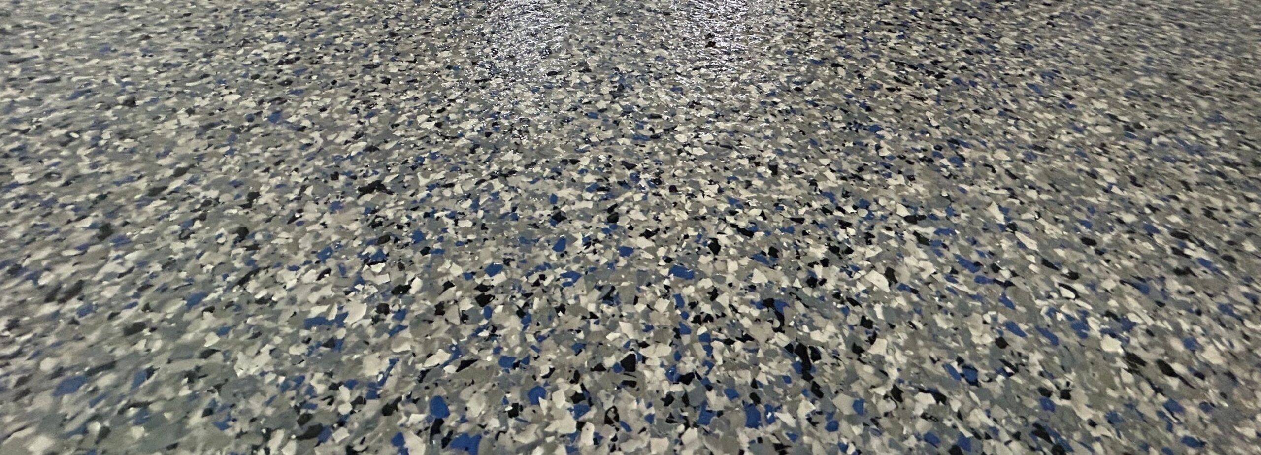 blue, gray and black flake floors