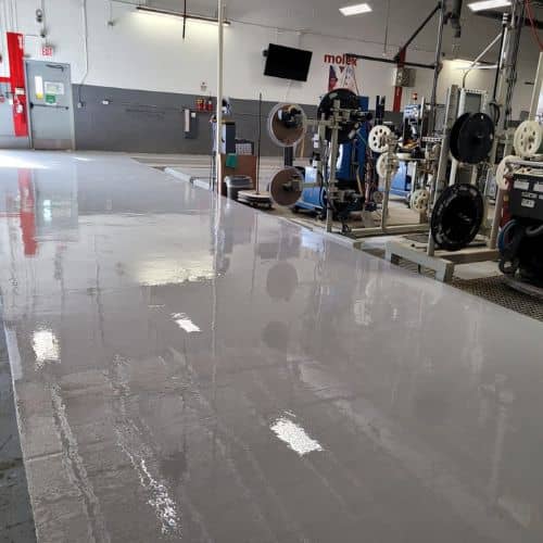 gray epoxy floors in manufacturing facility