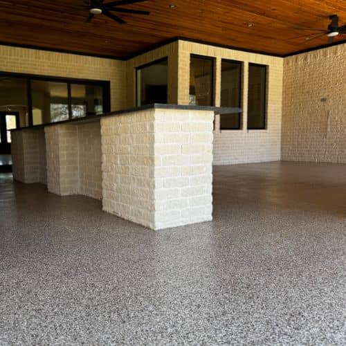 epoxy flake installation in outdoor kitchen