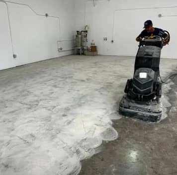 close-up of gentleman using concrete machine