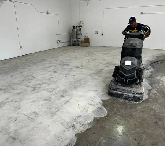 close-up of gentleman using concrete machine