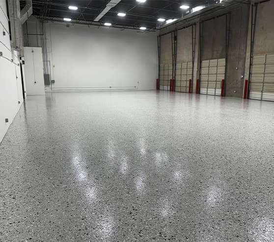 epoxy flooring inside of warehouse for commercial property