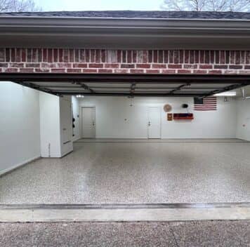 front view of homeowner garage with new flake epoxy flooring