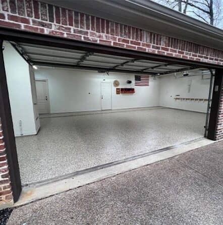 homeowner garage with new epoxy flooring installed