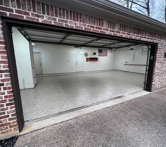 homeowner garage with new epoxy flooring installed