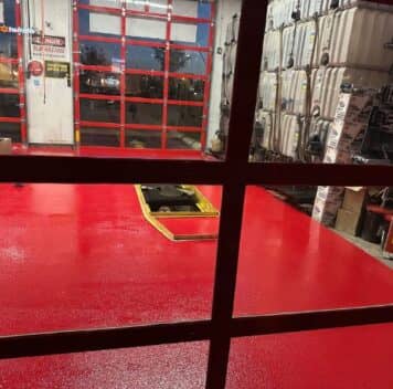 red epoxy flake flooring installed for Take 5 Oil Change garage