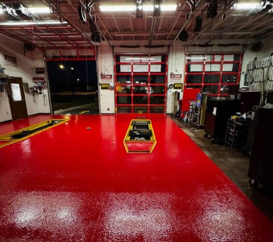 front view of Take 5 Oil Change garage with new red epoxy flake flooring