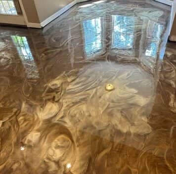 homeowner living room with freshly poured solid epoxy flooring