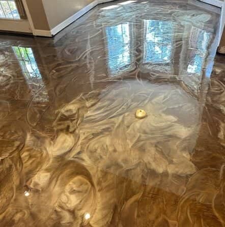 homeowner living room with freshly poured solid epoxy flooring