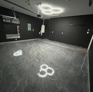homeowner garage with solid epoxy flooring installed