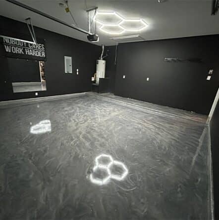 homeowner garage with solid epoxy flooring installed