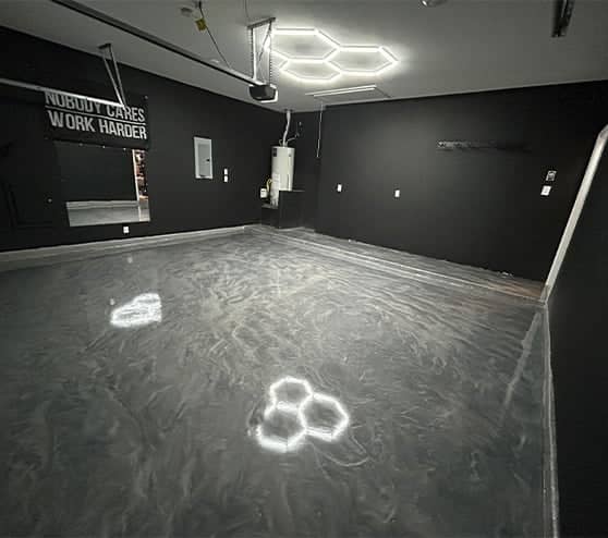 homeowner garage with solid epoxy flooring installed