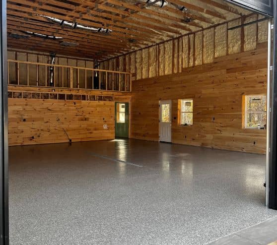 homeowner barn with new epoxy flake flooring installed