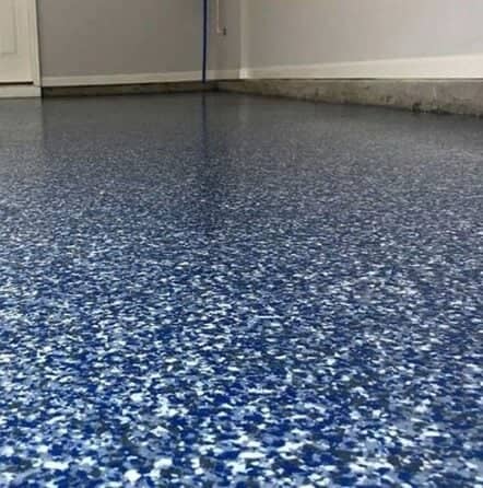 close-up of blue flake epoxy floor in garage