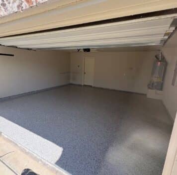 side view of homeowner garage with new dakota grey epoxy flake flooring installed