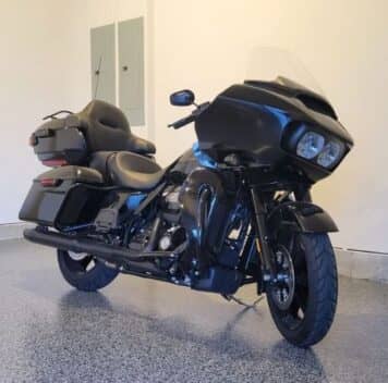 motorcyle parked on new epoxy flake flooring