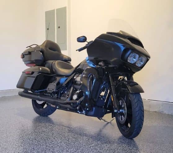 motorcyle parked on new epoxy flake flooring
