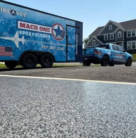 MACH ONE® truck in front of homeowner garage with trailer