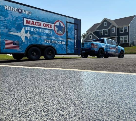 MACH ONE® truck in front of homeowner garage with trailer