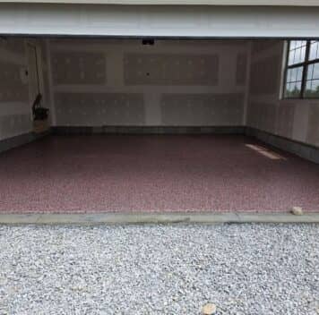 front view of homeowner garage with new epoxy flake flooring