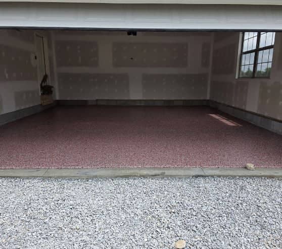 front view of homeowner garage with new epoxy flake flooring