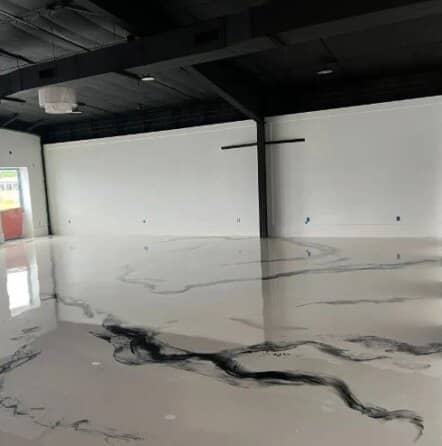 close-up of solid epoxy flooring installed for Boutique Owner