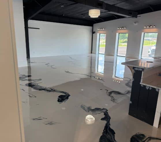 Boutique Owner store with freshly installed solid epoxy flooring