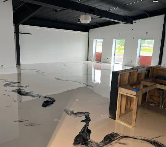 Boutique Owner store with freshly installed solid epoxy floor