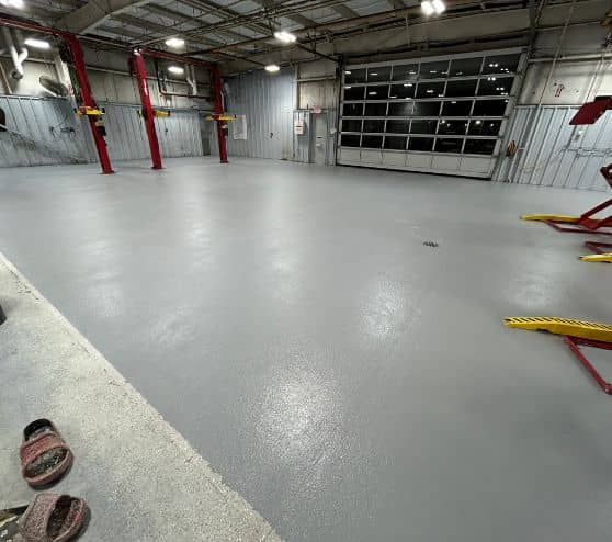 after portrait of Gullo Toyota and Mazda garage with new solid epoxy flooring