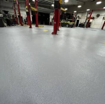 Gullo Toyota and Mazda garage with new solid epoxy flooring installed