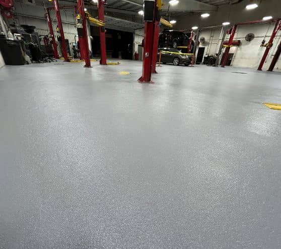 Gullo Toyota and Mazda garage with new solid epoxy flooring installed