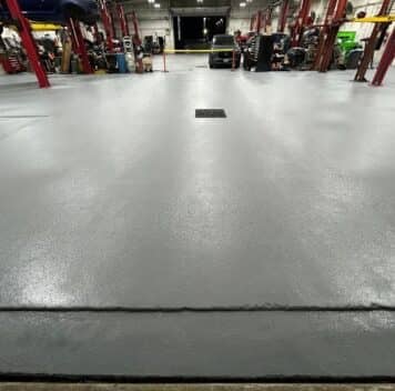 front view of Gullo Toyota and Mazda garage with new solid epoxy flooring installed