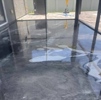 homeowner patio with new solid epoxy floor installed