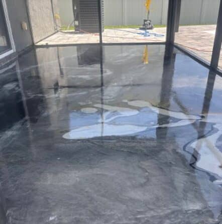homeowner patio with new solid epoxy floor installed