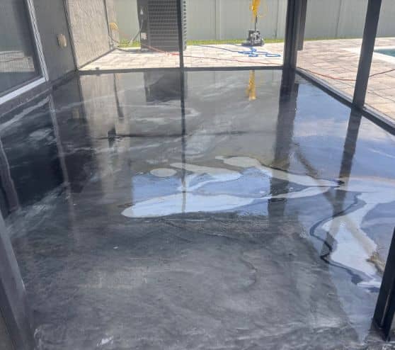 homeowner patio with new solid epoxy floor installed