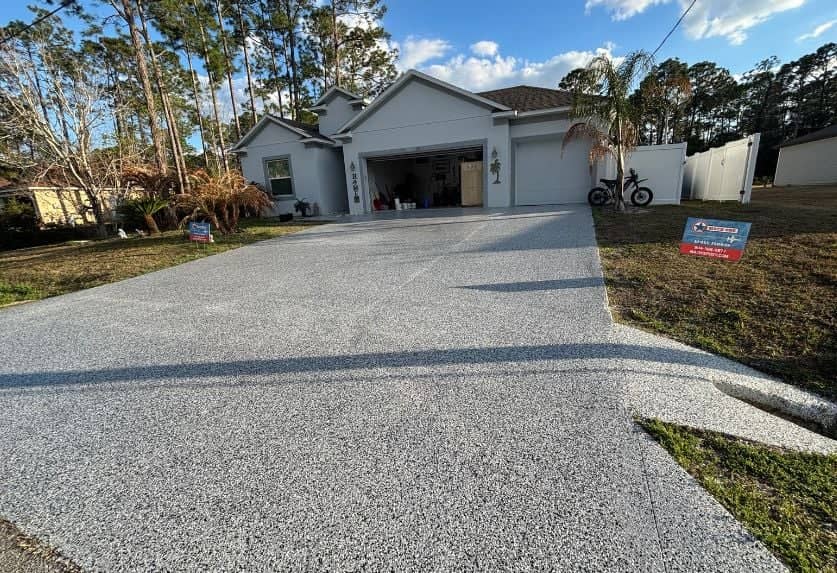 epoxy flake installation on concrete driveway