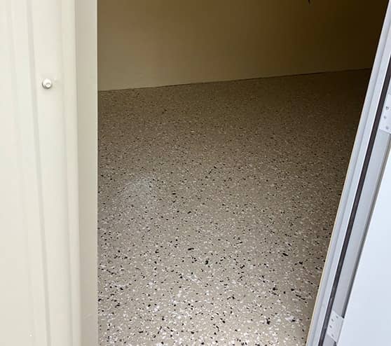 epoxy flake flooring installed for homeowner