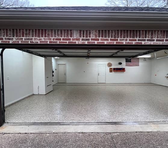 front view of homeowner garage with new flake epoxy flooring