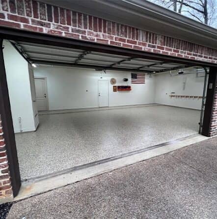 homeowner garage with new epoxy flooring installed