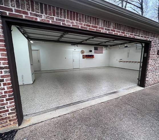 homeowner garage with new epoxy flooring installed