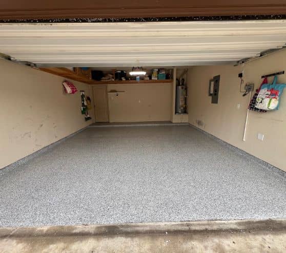 homeowner garage with new epoxy flooring