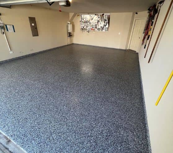 homeowner garage with new epoxy flooring installed