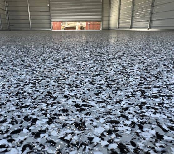 close-up of homeowner epoxy flake flooring
