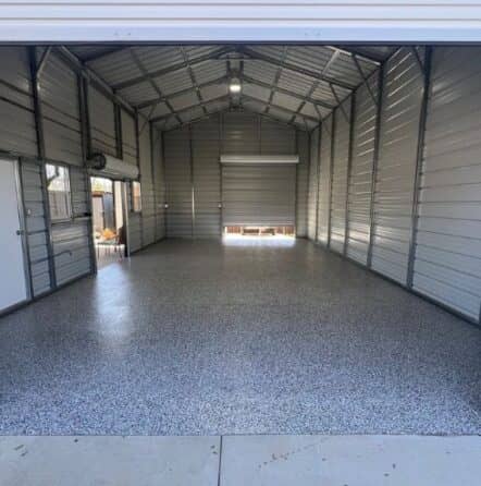 homeowner two car garage with new epoxy flooring installed