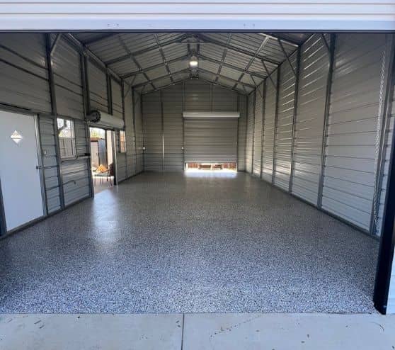 homeowner two car garage with new epoxy flooring installed