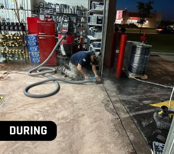 during portrait of MACH ONE® employee installing new floor for Take 5 Oil Change