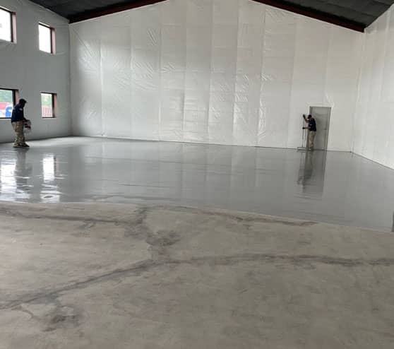 progression of epoxy flake flooring project in Burleson, TX