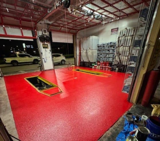 side view of take 5 oil garage with new epoxy flooring installed