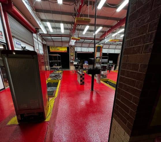 Take 5 Oil Change with new red epoxy flooring