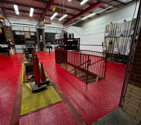 red solid epoxy flooring for Take 5 Oil Change garage